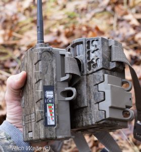 The Moultrie wireless field modem with the Moultrie 888i mini game camera -- all in one hand.